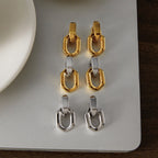Gold tone two-tone and silver tone earring pairs