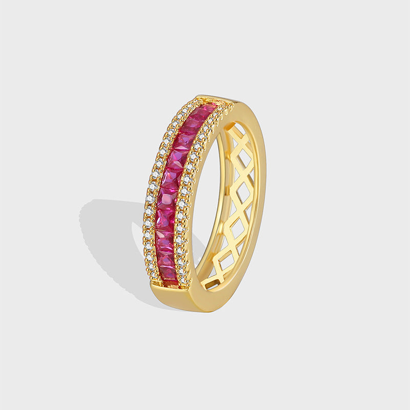 isolated gold plated red zirconia three-row band ring