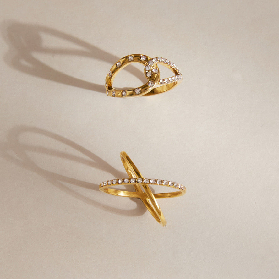 Gold tone open-loop and crossed-band rhinestone rings