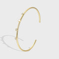 gold plated zirconia station open cuff bracelet