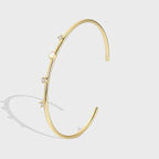 gold plated zirconia station open cuff bracelet