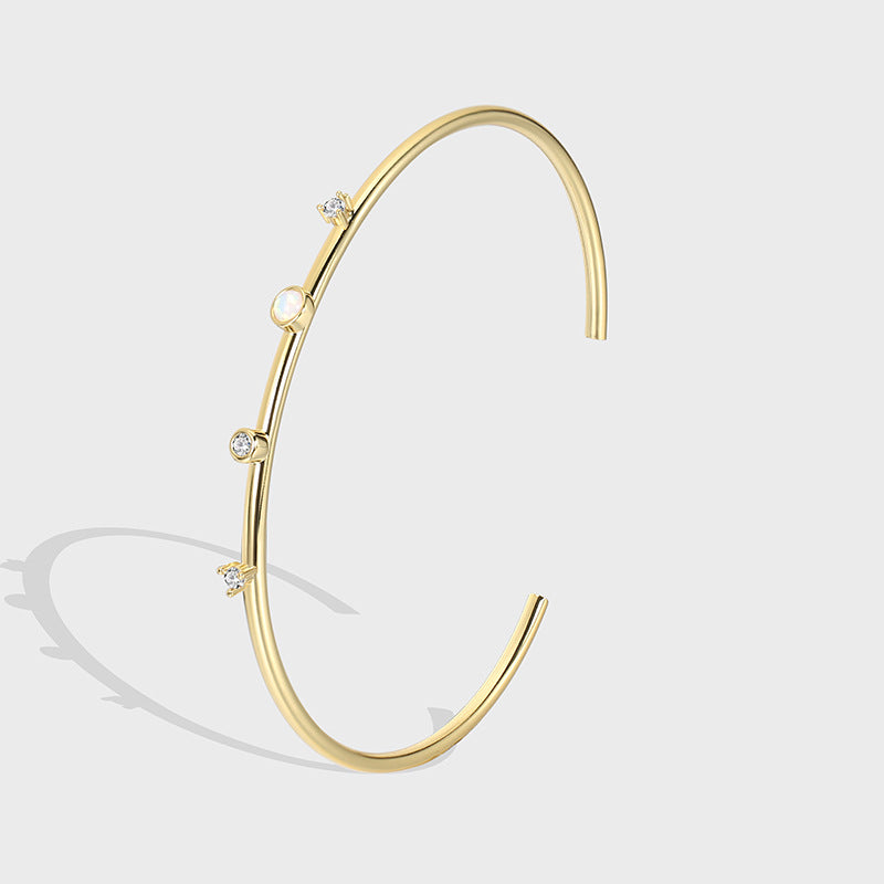 gold plated zirconia station open cuff bracelet