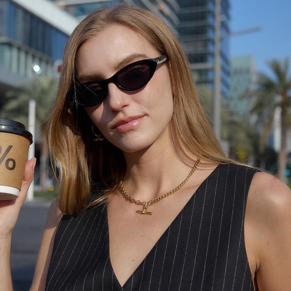 Close view of the T-bar necklace being worn