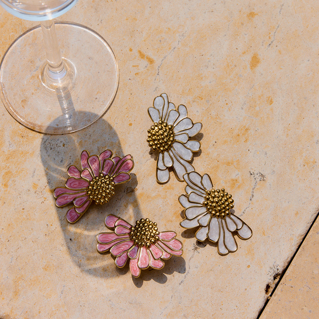 Gold Tone Colored Floral Stainless Steel Stud Earrings — paired earrings on a neutral surface