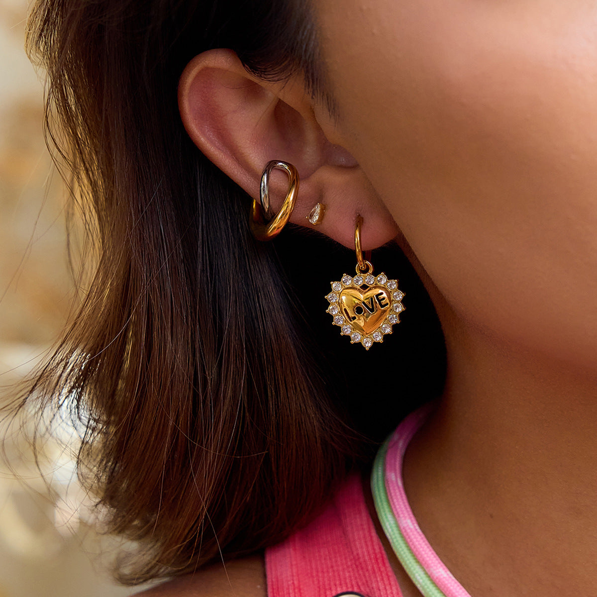 Stainless Steel Heart and Clear Accent Earring Collection – close-up view