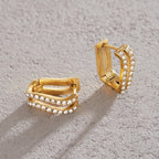 Wave earrings laid at different angles