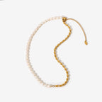 Full view of half white half gold stainless steel necklace