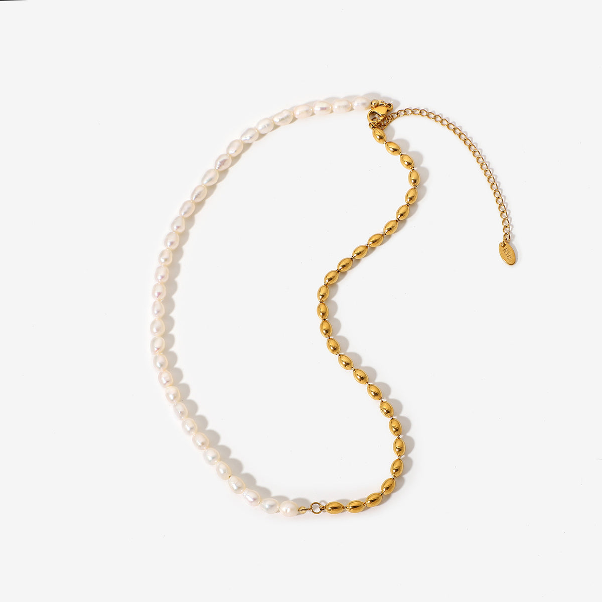 Full view of half white half gold stainless steel necklace