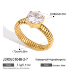 Round zirconia ring with ribbed band and weight information
