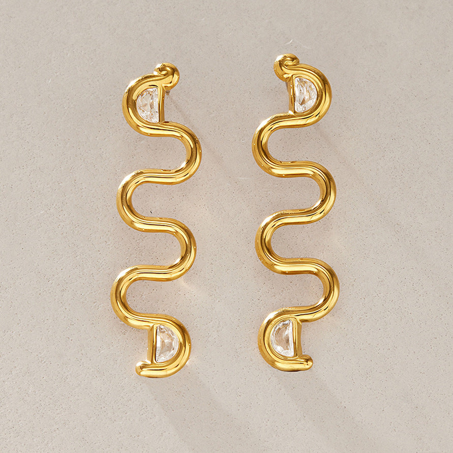 Pair of gold tone serpentine wave earrings