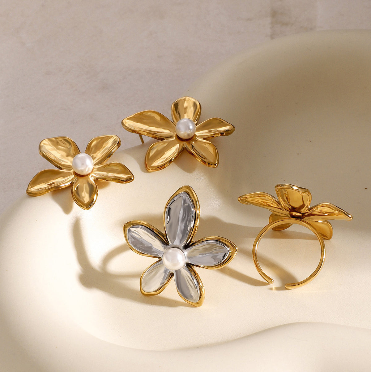 Gold-Tone Floral Stainless Steel Earrings and Rings shown on model
