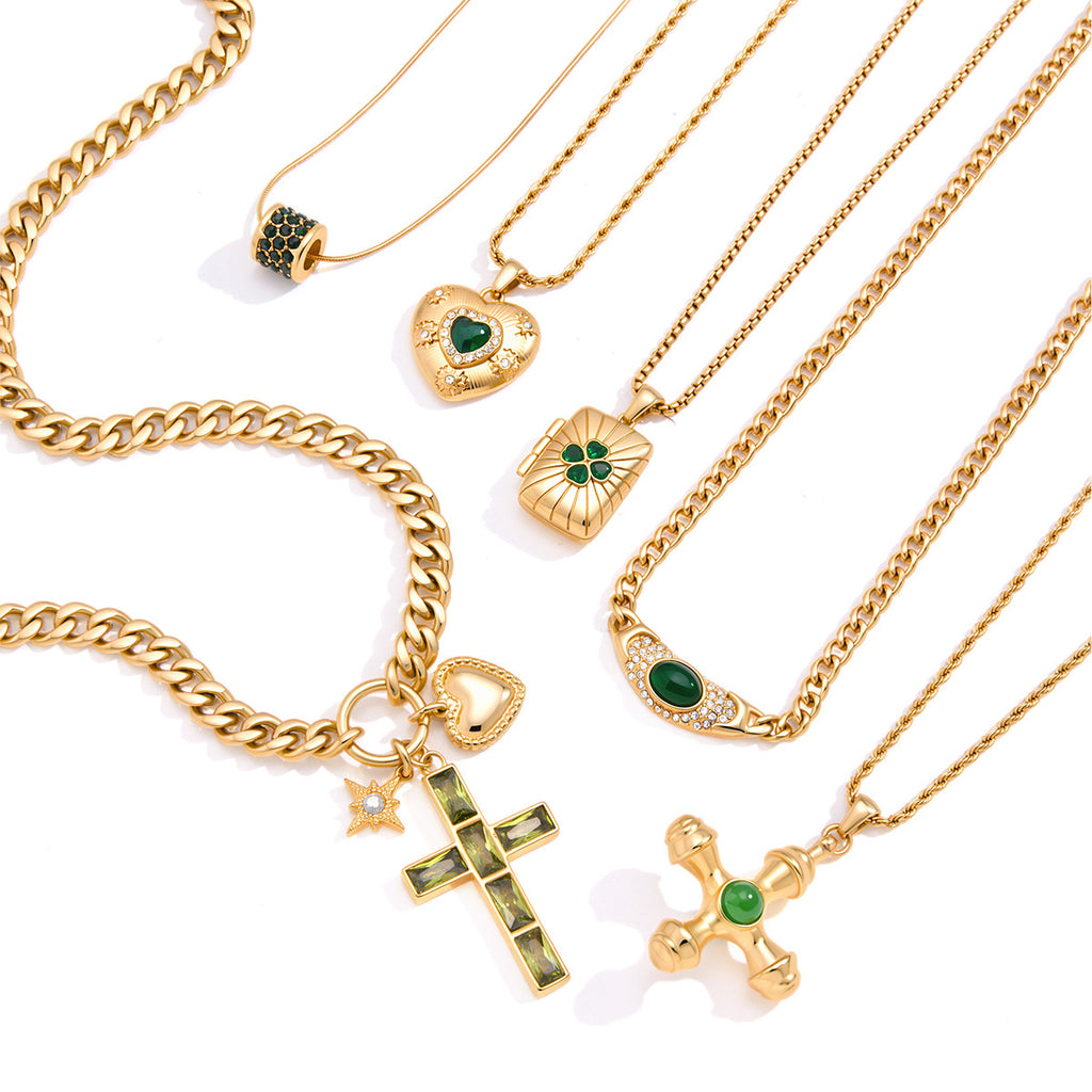 Six gold-tone stainless steel necklace designs with green accents