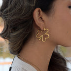 open four-leaf clover statement earrings in side profile