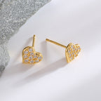 front and side views of compact clear zirconia heart studs