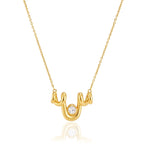 Three-curve pendant on a fine chain