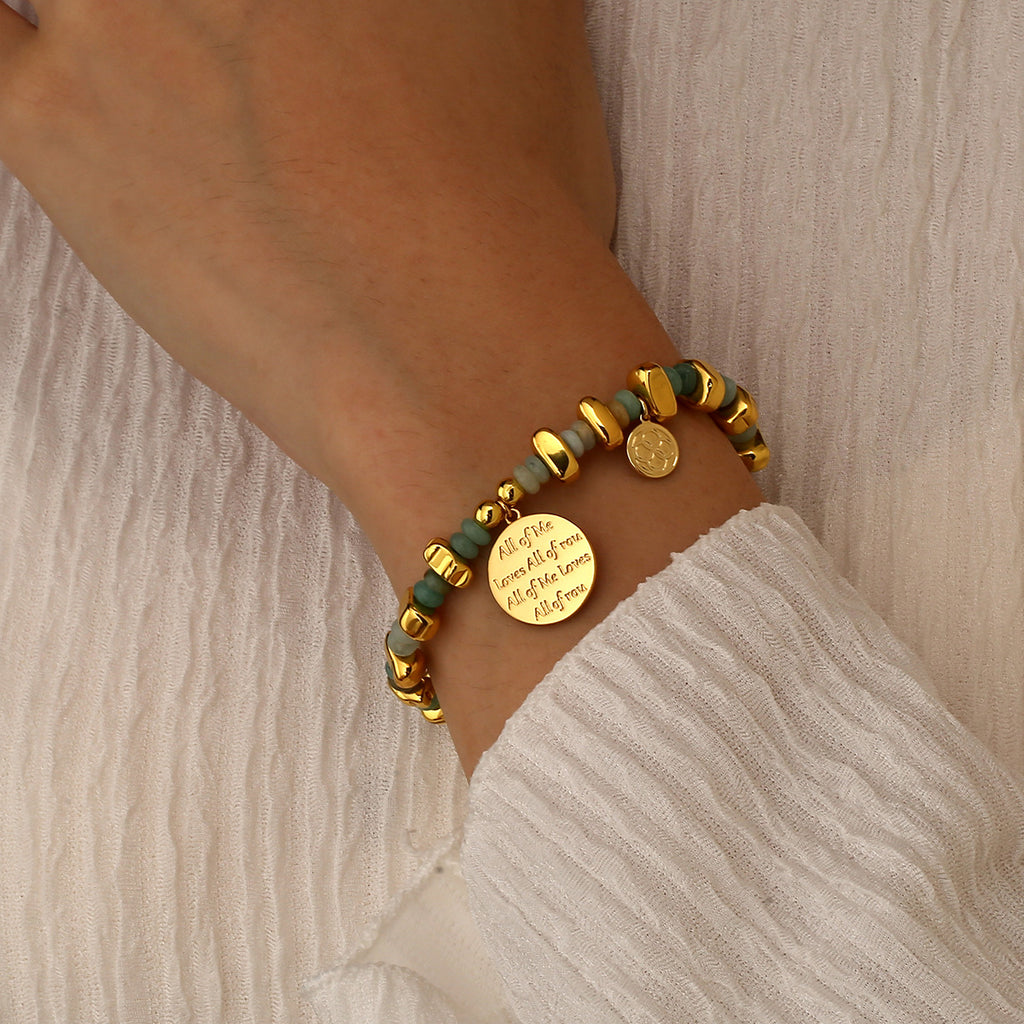 model wearing the engraved message medallion bead bracelet