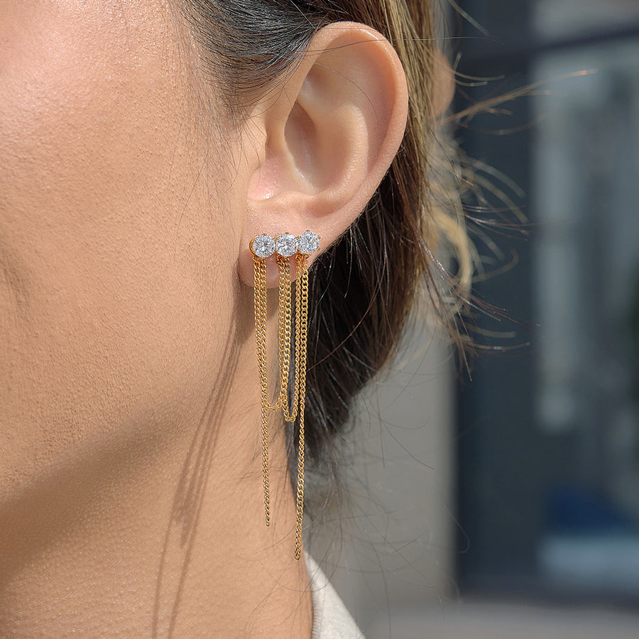 gold plated triple-stone chain tassel earring worn on ear