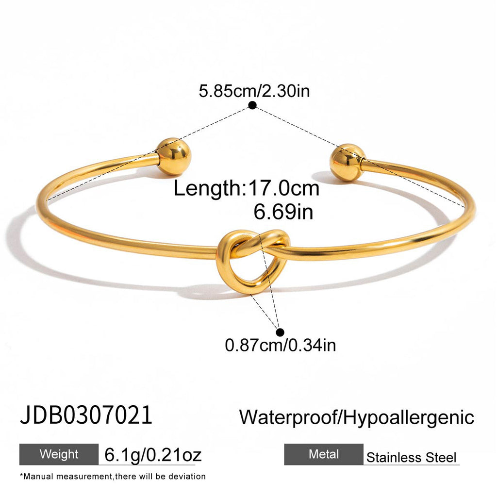 Slim knotted open cuff with rounded tips