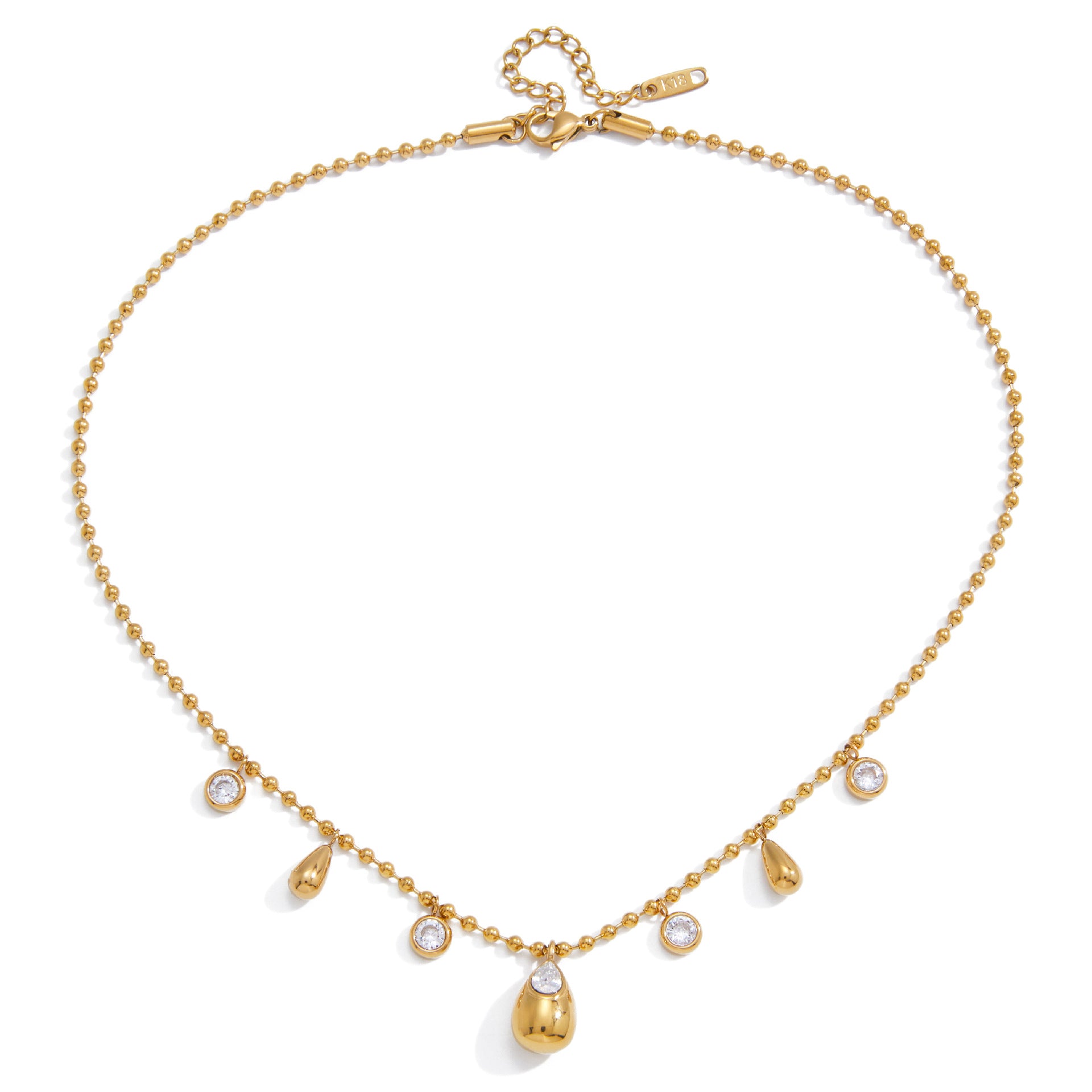 isolated teardrop charm necklace with round clear accents