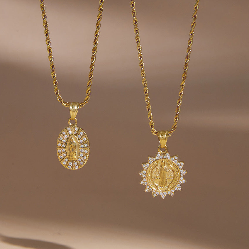 Clear-stone borders around oval and sunburst medallions