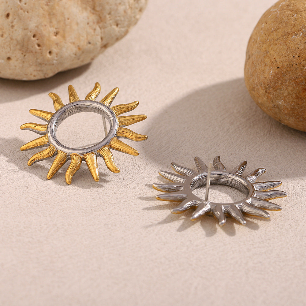 post-back view of two-tone hollow sunburst earrings