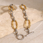 Gold and silver-tone link bracelet angled close-up