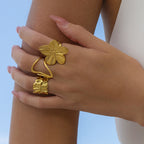 Gold-Tone Stainless Steel Sculptural Flower Ring Collection — front view