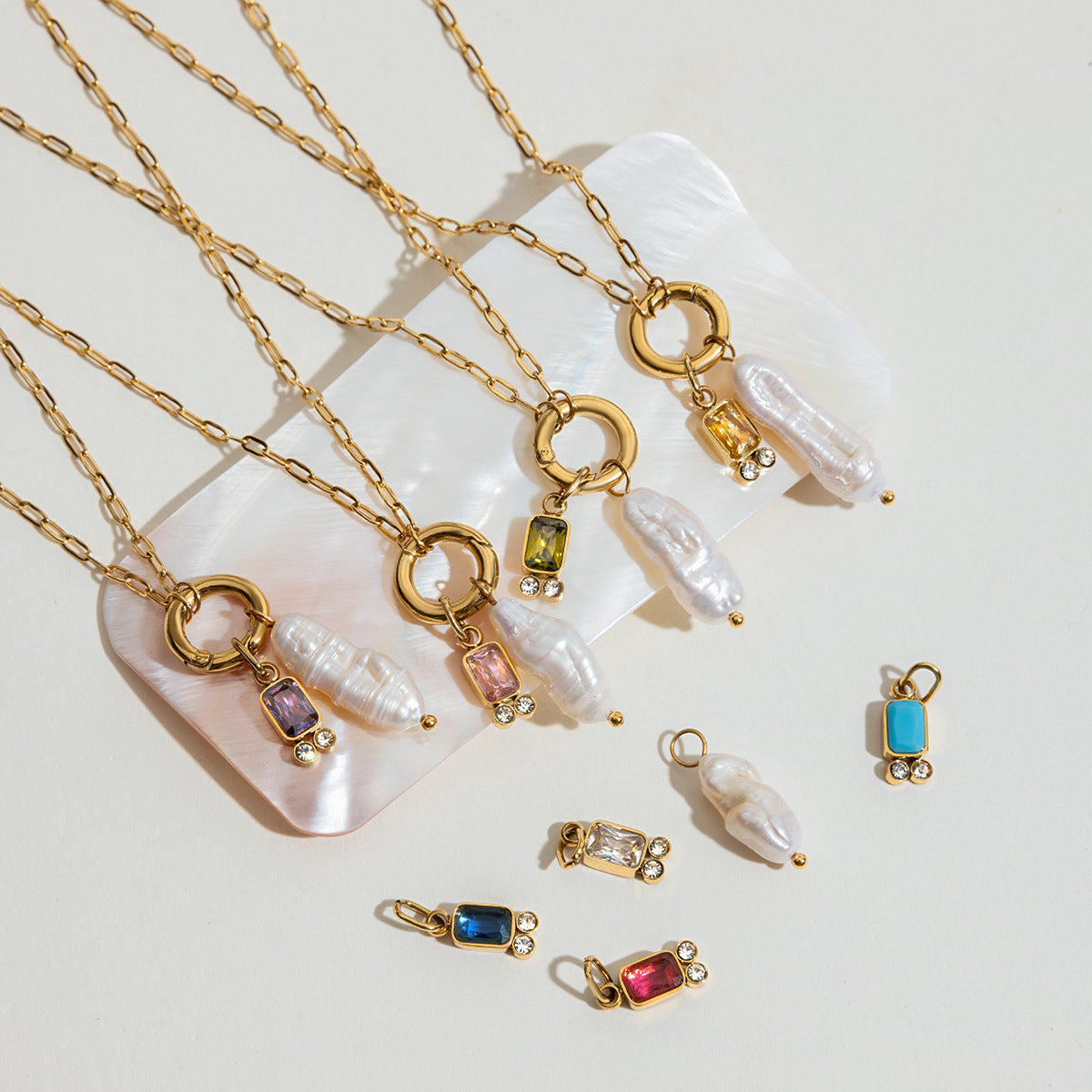 Pearl drop necklaces with interchangeable colored accents