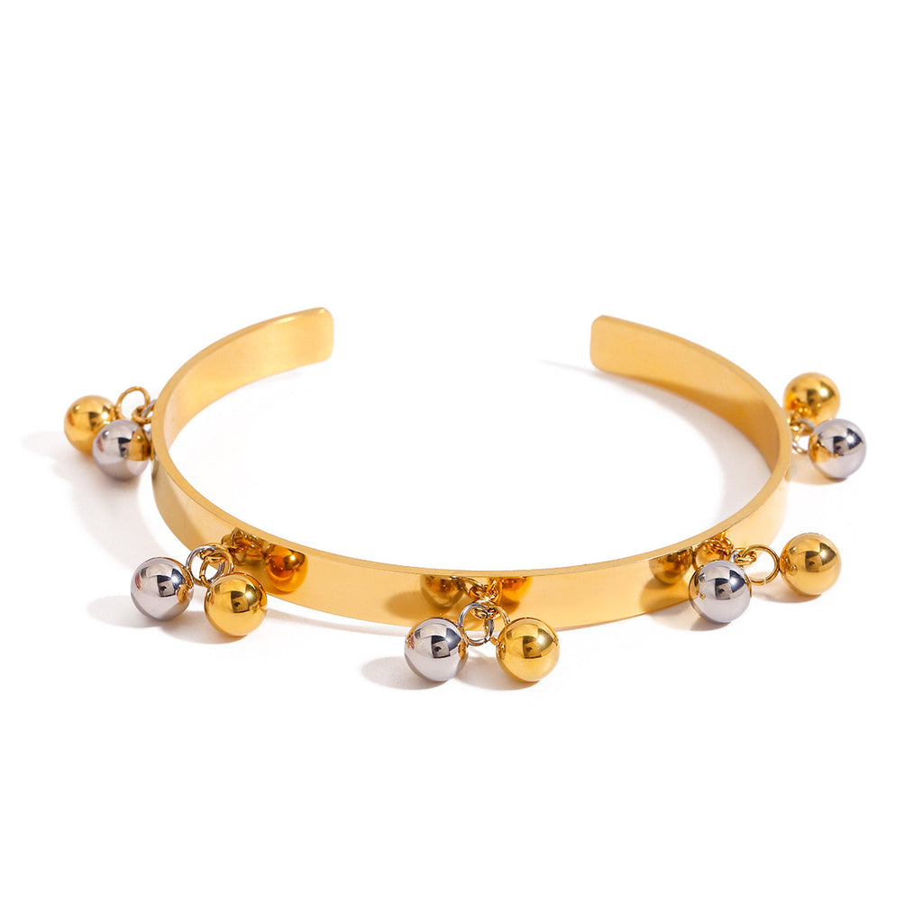 Front view of the two-tone open cuff bracelet