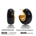 Black rounded resin hoop with gold tone inner curve