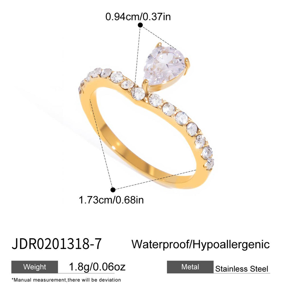 Pear solitaire ring with clear stone band