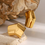 Folded Sculptural Stainless Steel Stud Earrings in Two Finishes styled product view