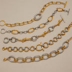 Five mixed-tone link bracelets arranged in rows