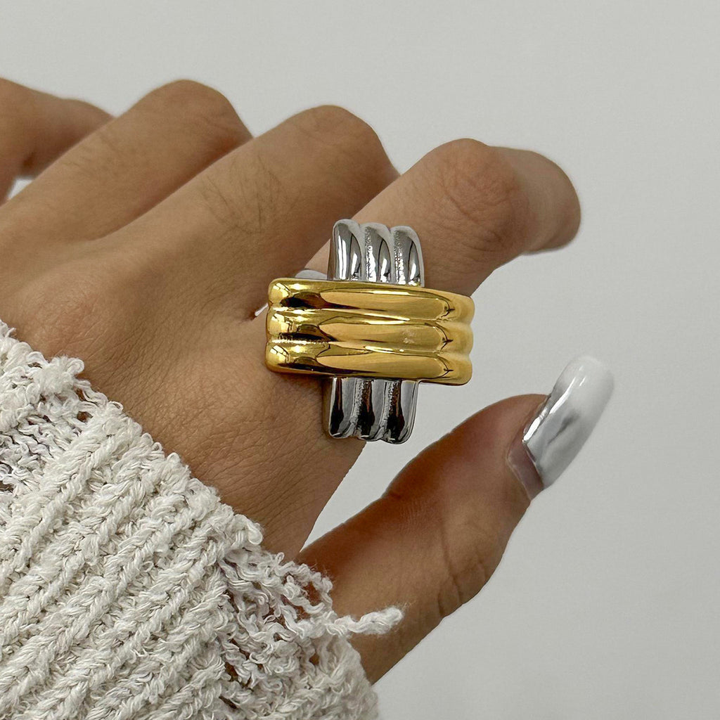 Two-Tone Stainless Steel Crossover Stud Earrings and Ring — styled view