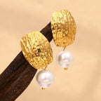 gold plated hammered stud earrings with single white pearl drops