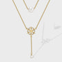 gold plated layered snowflake necklace with white shell pearl beads