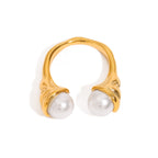 Isolated gold plated stainless steel double pearl-look ring