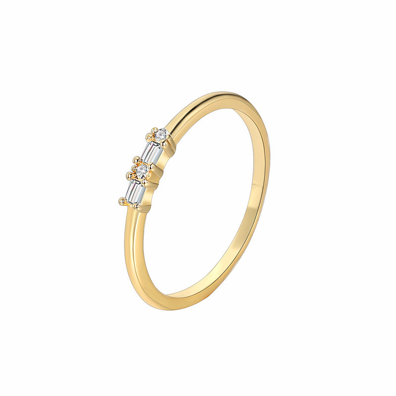 front cutout of delicate baguette and round clear-stone ring