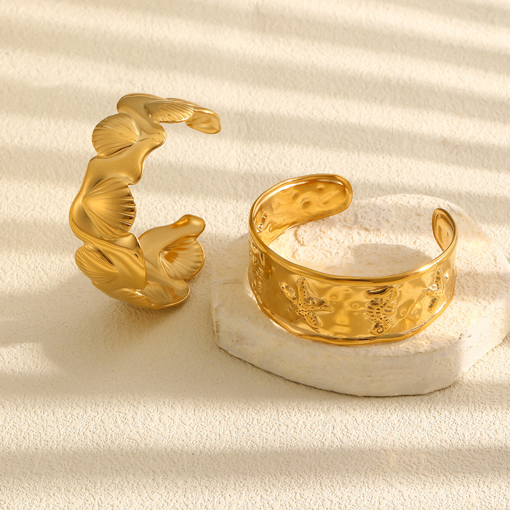 Rear and side views of two open coastal cuffs