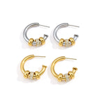 Open hoops showing polished and stone-set accent rings