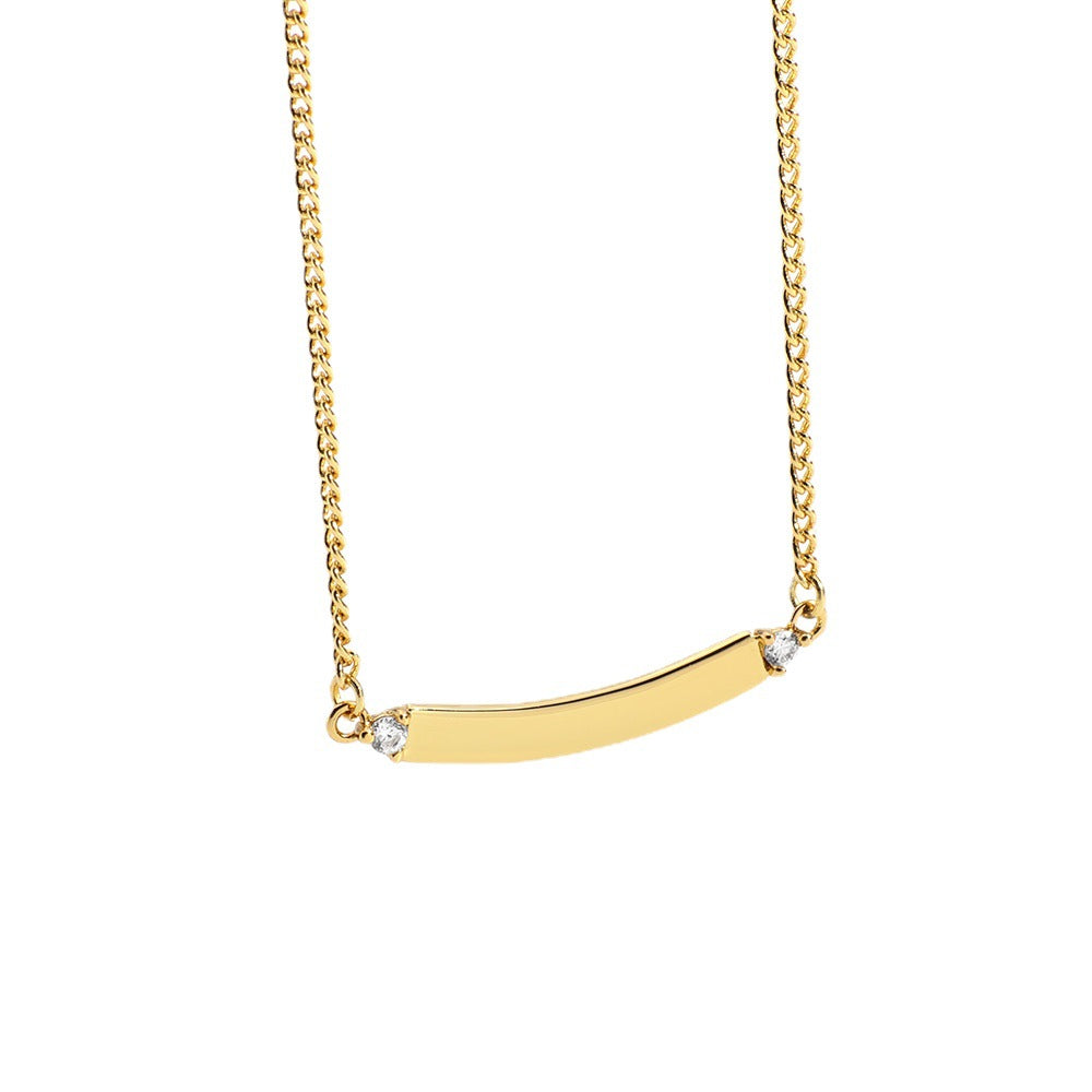isolated front view of gold plated brass bar necklace