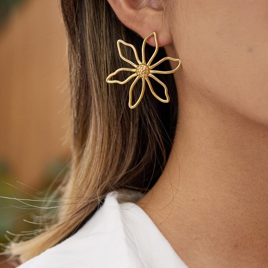 Gold-Tone Clear Accent Floral Stainless Steel Stud Earrings styled product view