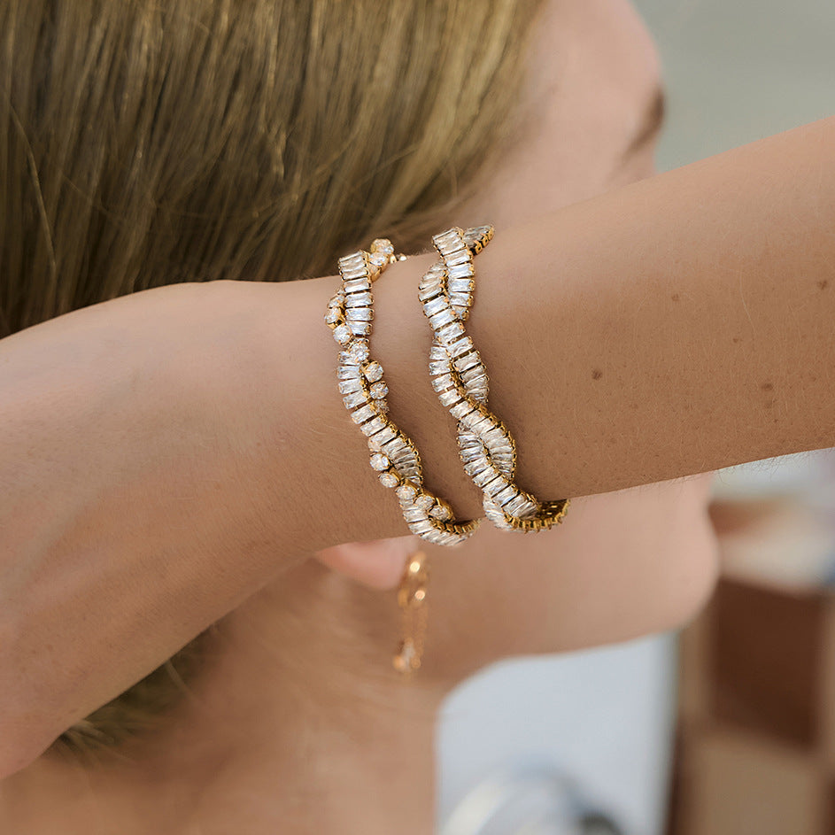 Two rippled stone bracelets stacked together
