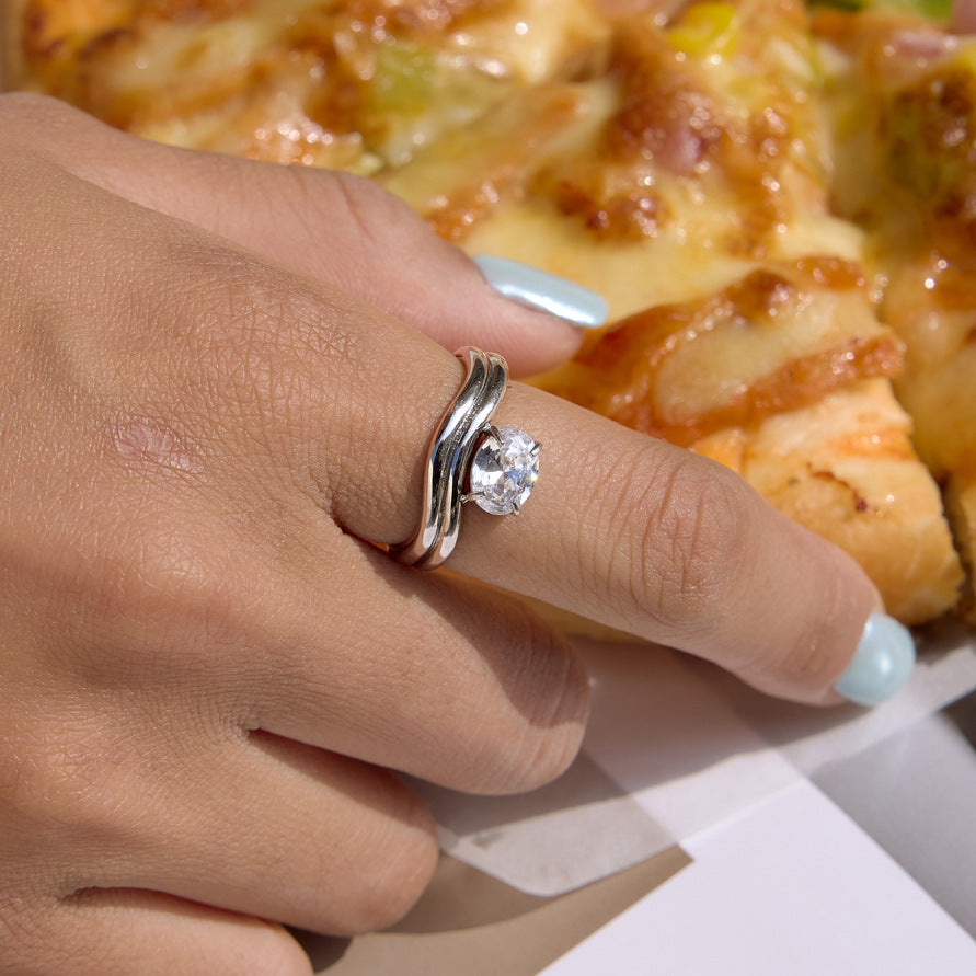 Silver tone double-band ring shown on hand