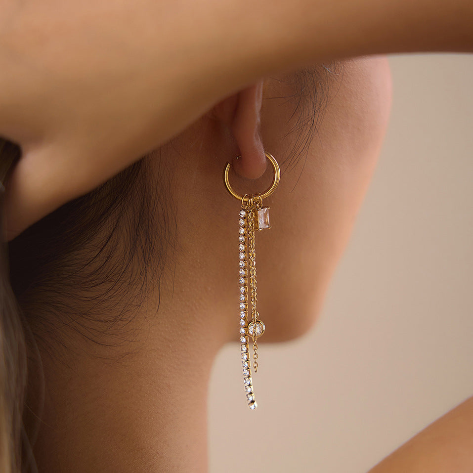 Long rhinestone fringe hoop worn close-up