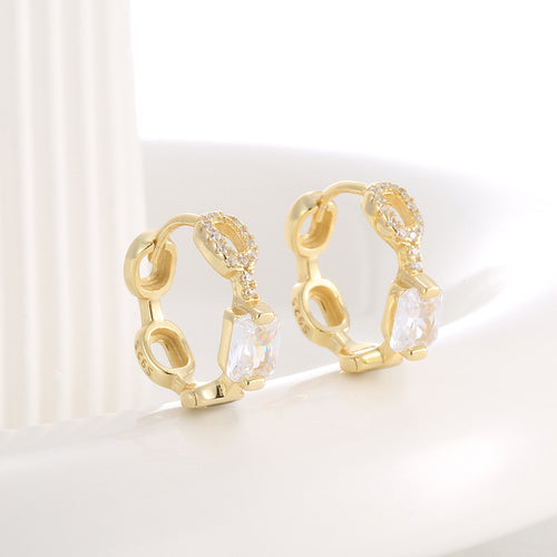 angled pair of open-link hoops with square and small zirconia