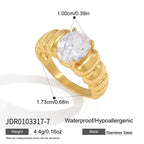 Ribbed solitaire ring with raised clear center stone