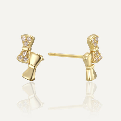 gold plated asymmetric clear stone bow stud earrings front and side view
