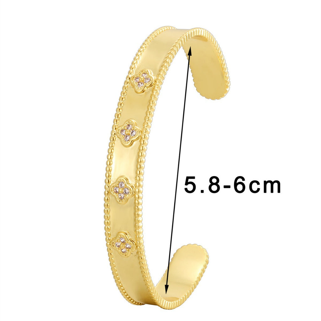 clover clear stone open bangle with supplier-listed 5.8 to 6 cm diameter