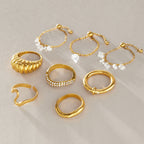 Clear drop chain rings with several gold tone bands